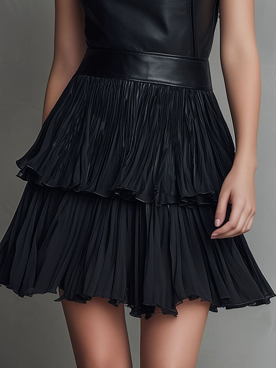 Noa · Vestido mini con falda plisada