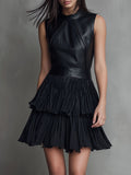 Noa · Vestido mini con falda plisada