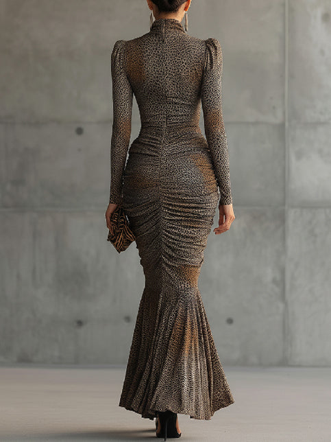 Marisol · Vestido maxi plisado con estampado leopardo