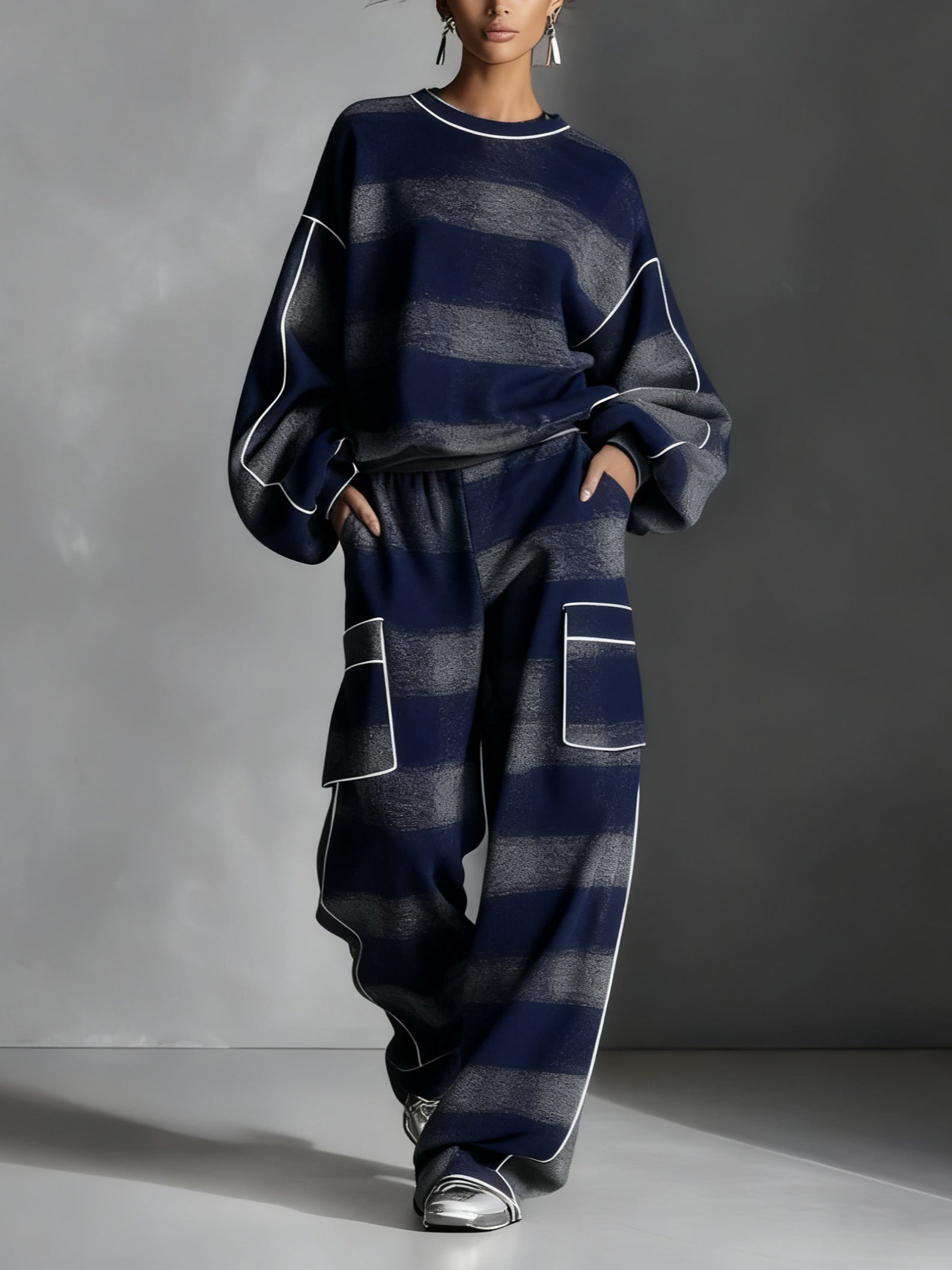 Sudadera a rayas azul y gris con pantalones casuales de dos piezas